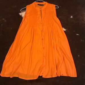 Bright orange, very cute top